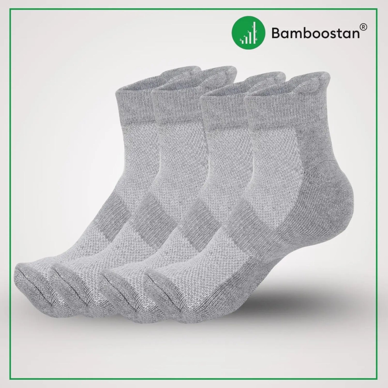 Four pairs of gray bamboo socks with Bamboostan logo on a light gray background