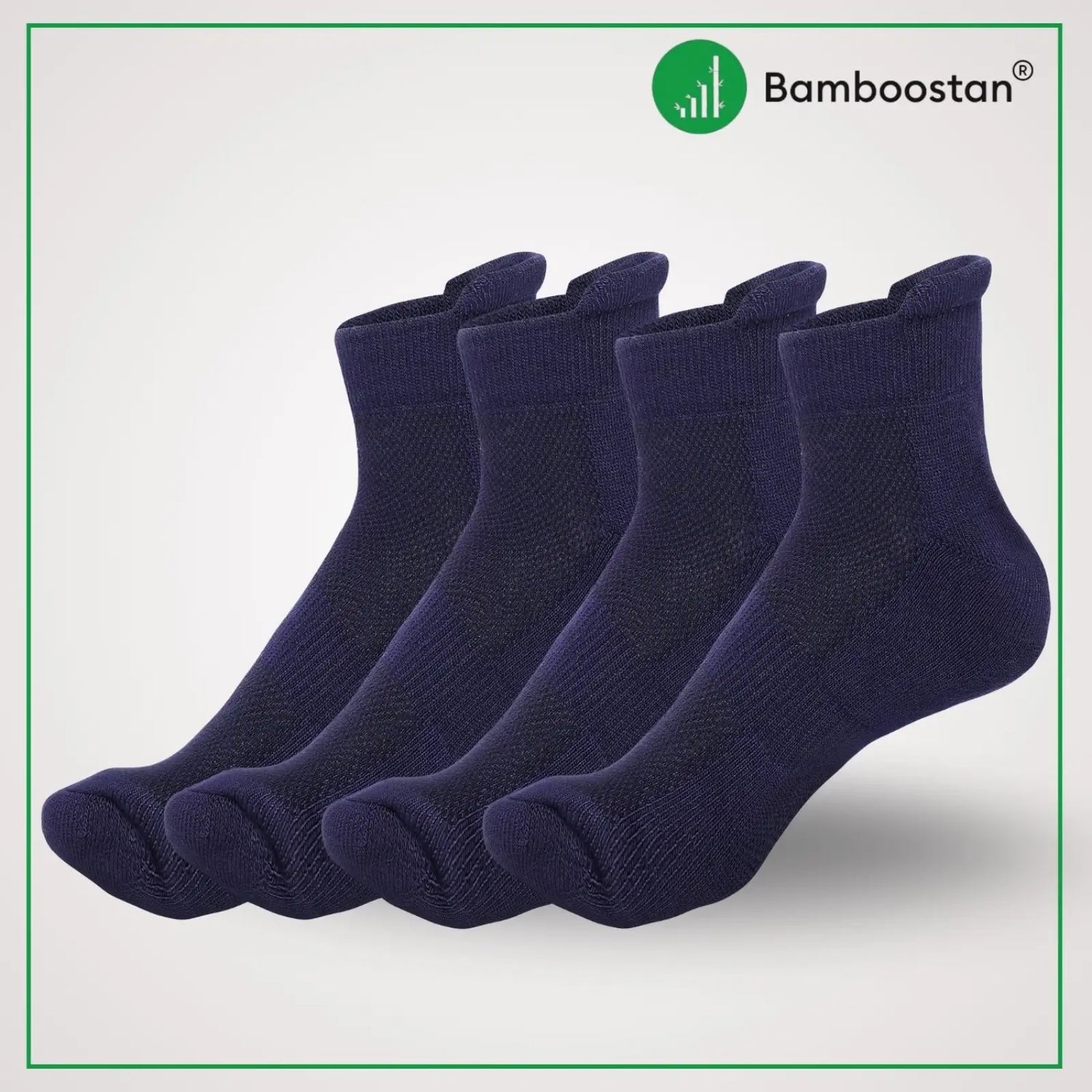 Set of dark blue bamboo socks with Bamboostan logo on a light gray background