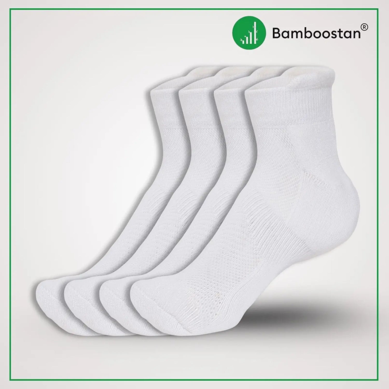 Set of white bamboo socks with Bamboostan logo on a light gray background