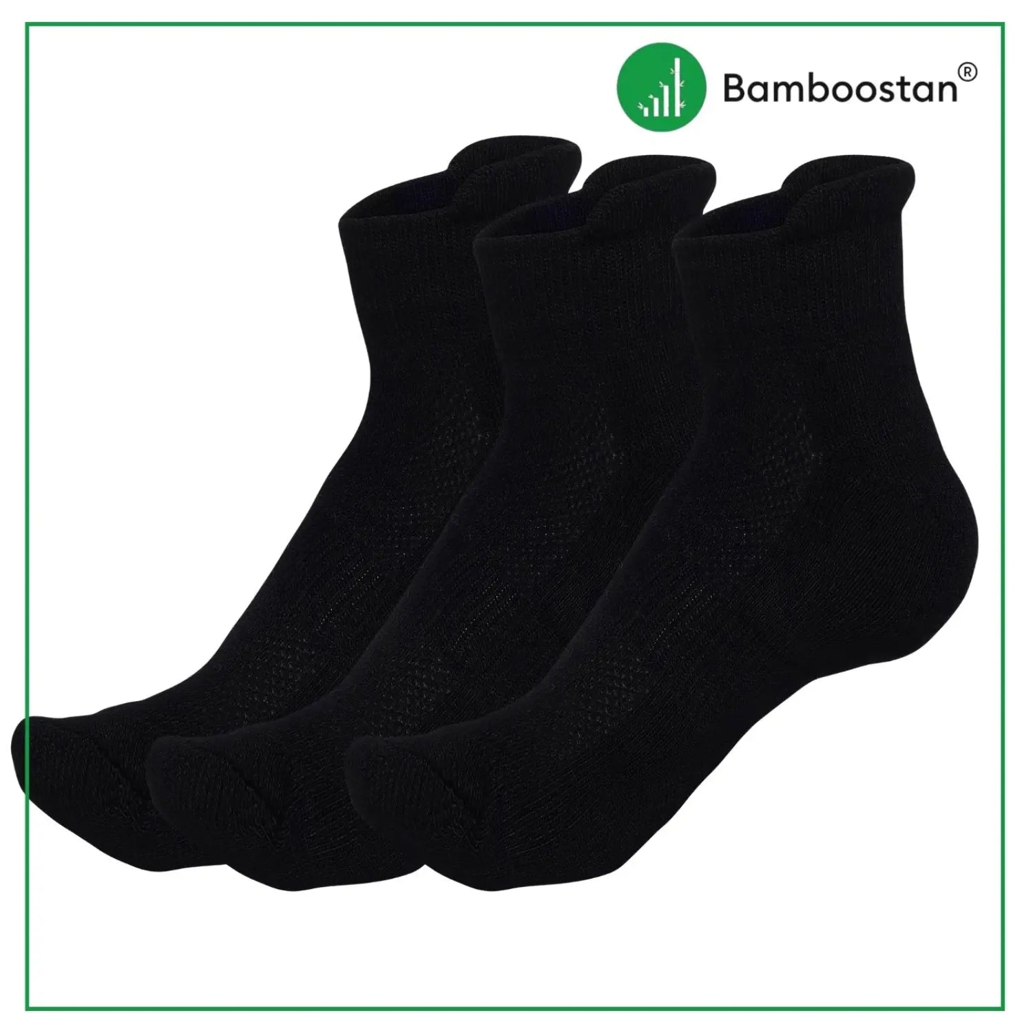 Three black bamboo socks on a white background with Bamboostan logo.
