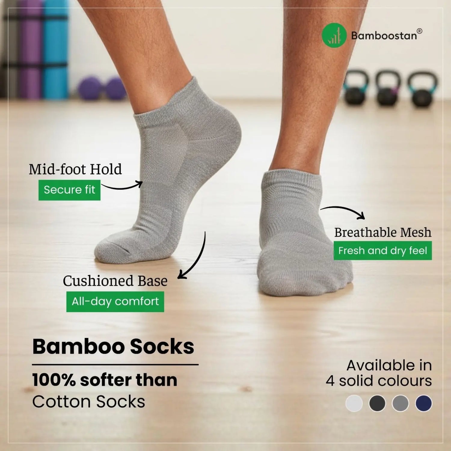 Gray bamboo socks with features highlighted on a wooden floor background