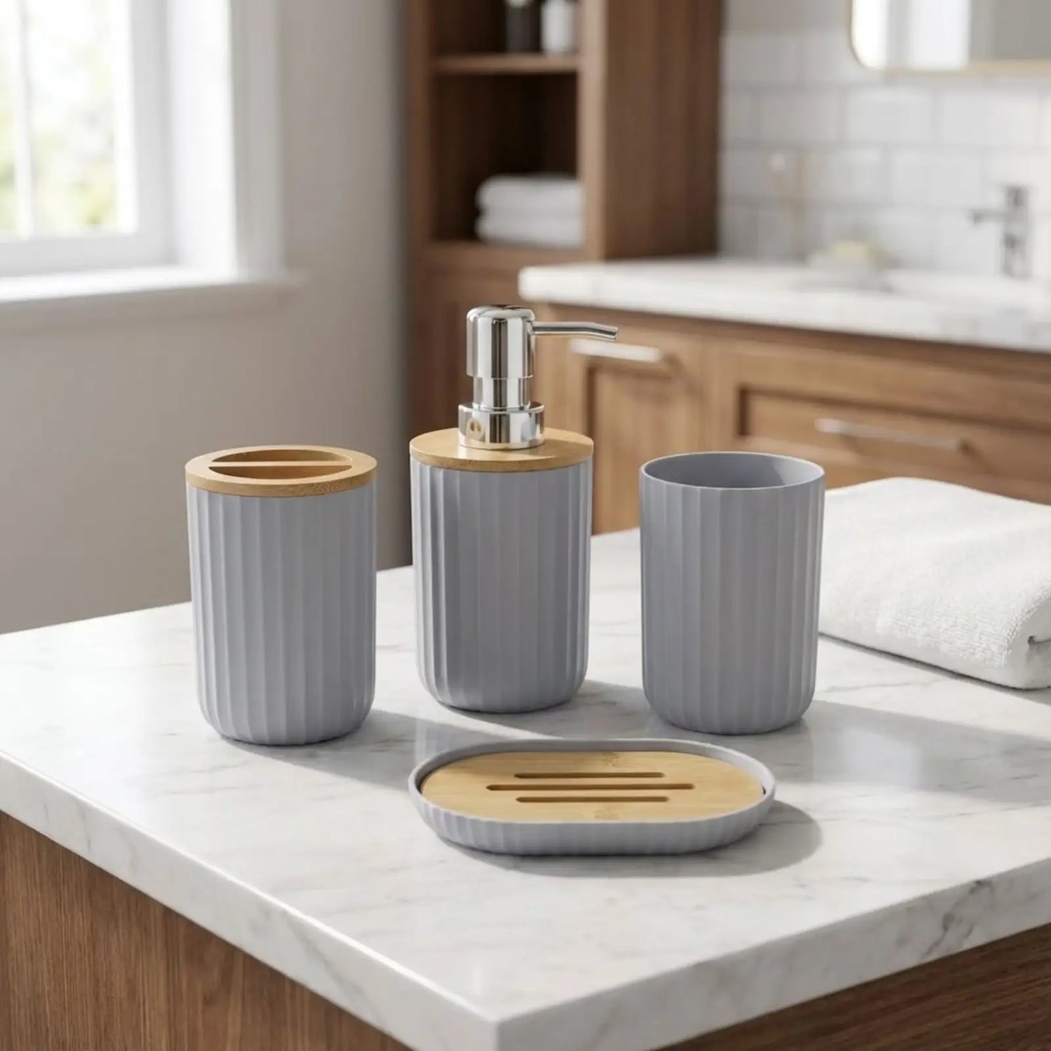 Bamboo bathroom accessories set on a counter with a neutral color scheme