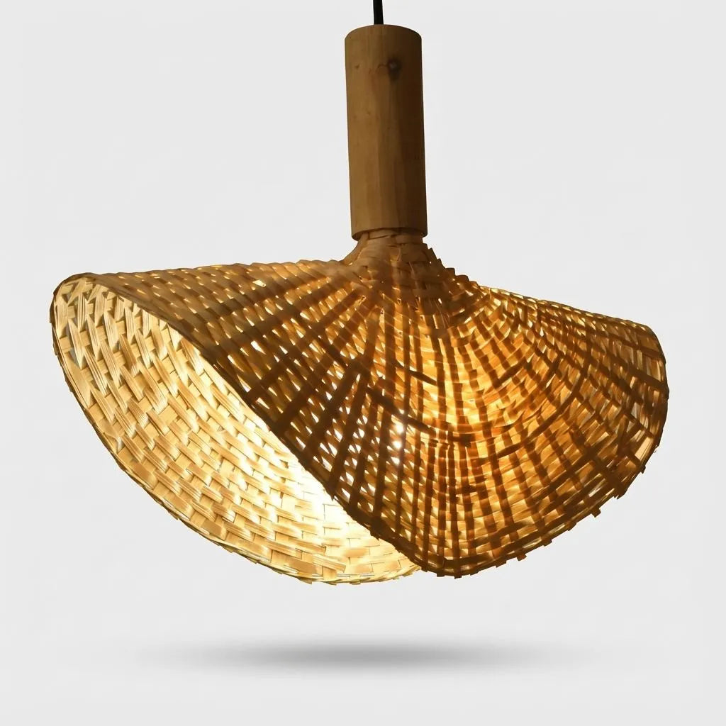 Woven bamboo pendant light on a white background
