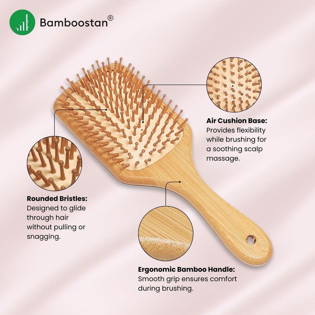 Bamboo hairbrush with features highlighted on a light pink background.