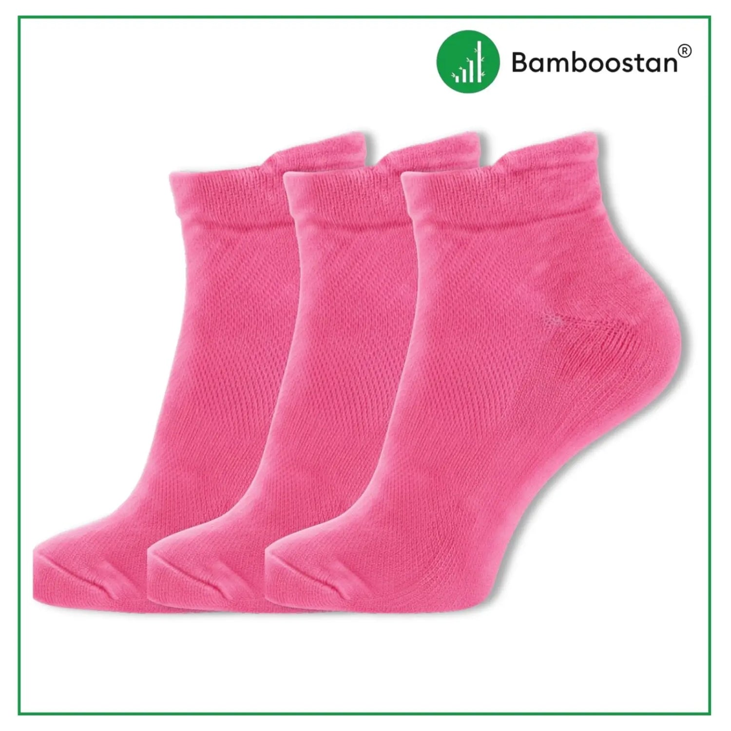 Three pairs of pink socks with Bamboostan logo on a white background