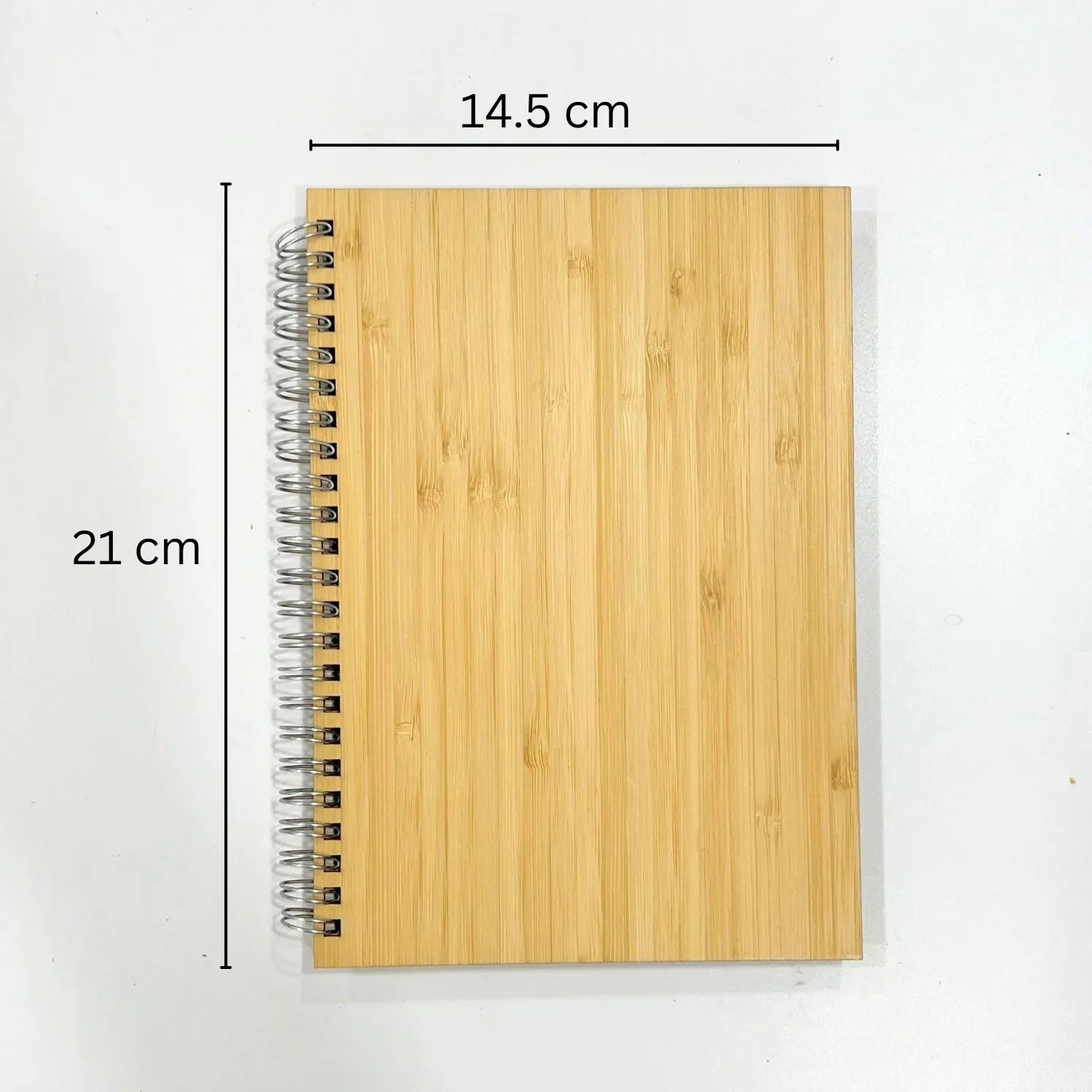 Bamboo cover notebook with dimensions labeled on a white background