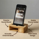 Bamboo Amplifier phone holder with passive sound boost, acoustic channel build, and retro dock design.
