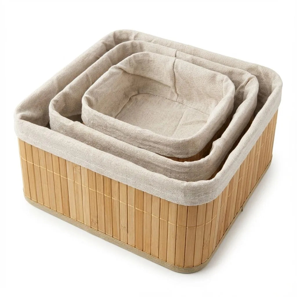 Set of three woven baskets with beige fabric liners on a white background