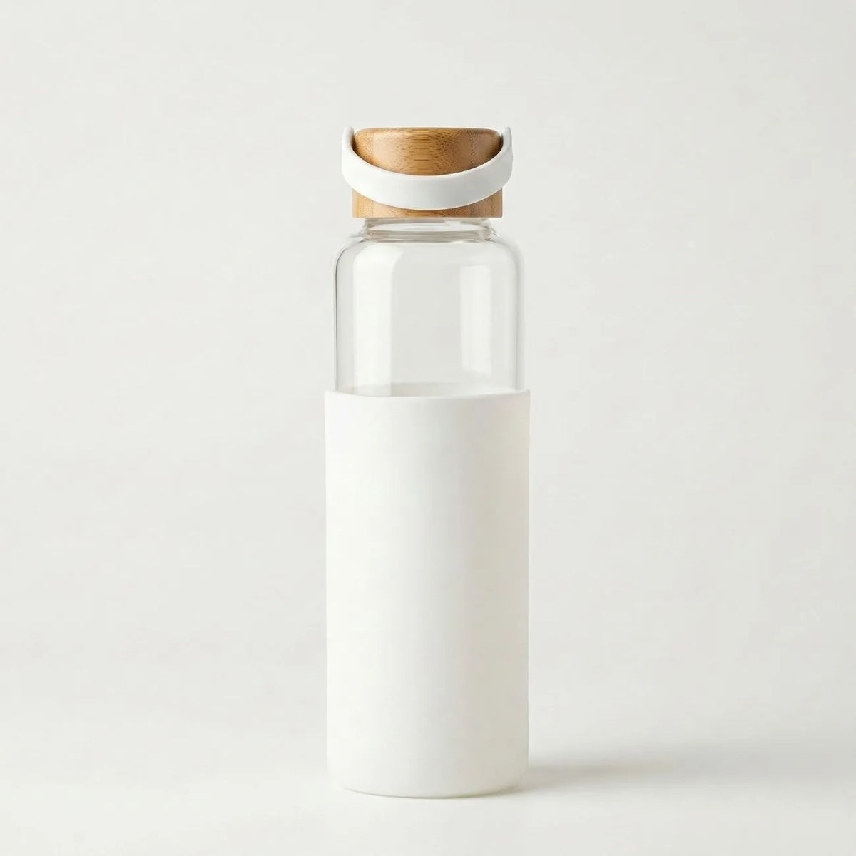 Bamboo Water Bottle with a bamboo cap and white sleeve, designed for easy grip and versatility on the go.