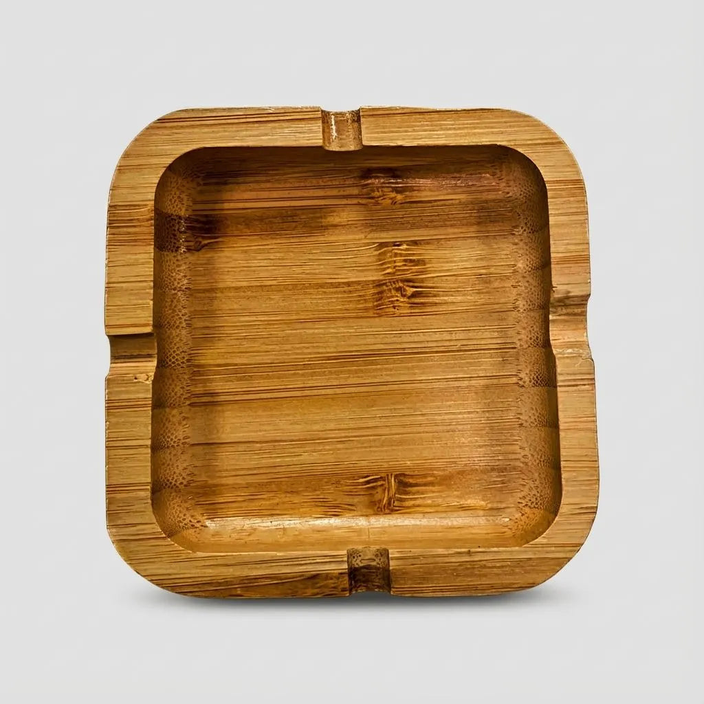 Bamboo square ashtray with a natural finish on a light gray background