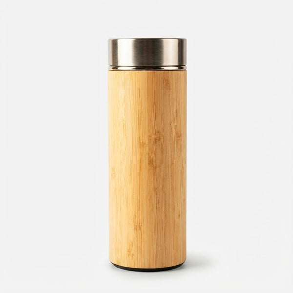 Bamboo bottle with a metallic lid on a white background