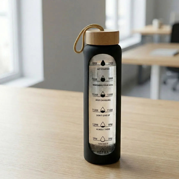 Bamboo Bottle 1 Litre with time markers for daily hydration in sleek black design.
