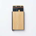 Bamboo pocket card holder displaying debit cards in a sleek, modern design for daily use.