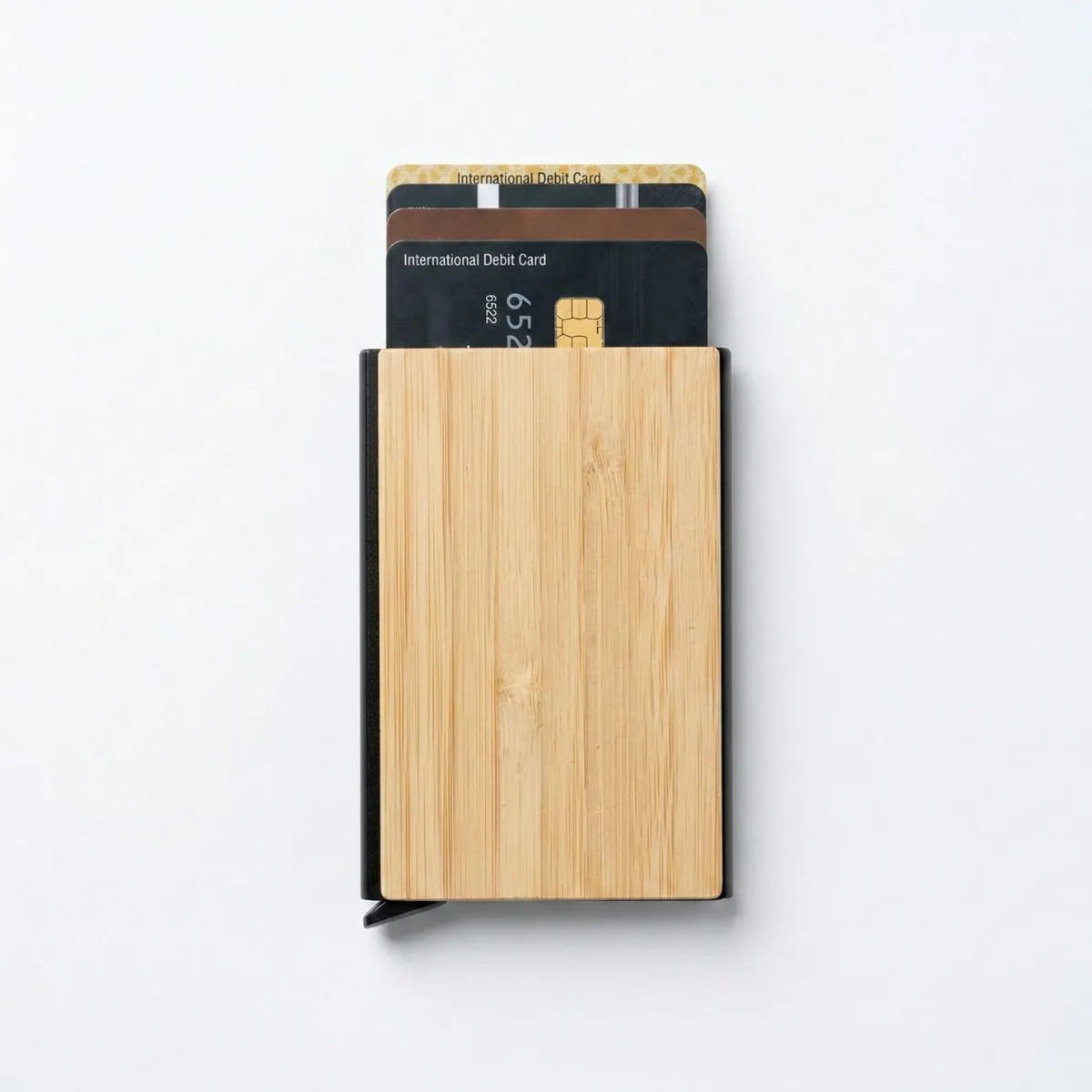 Bamboo pocket card holder displaying debit cards in a sleek, modern design for daily use.