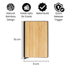 Bamboo pocket card holder with natural bamboo design, metal build, and quick release trigger, holds up to six cards.