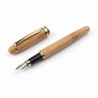 Premium Bamboo Pen with gold accents, perfect for smooth writing and everyday use.