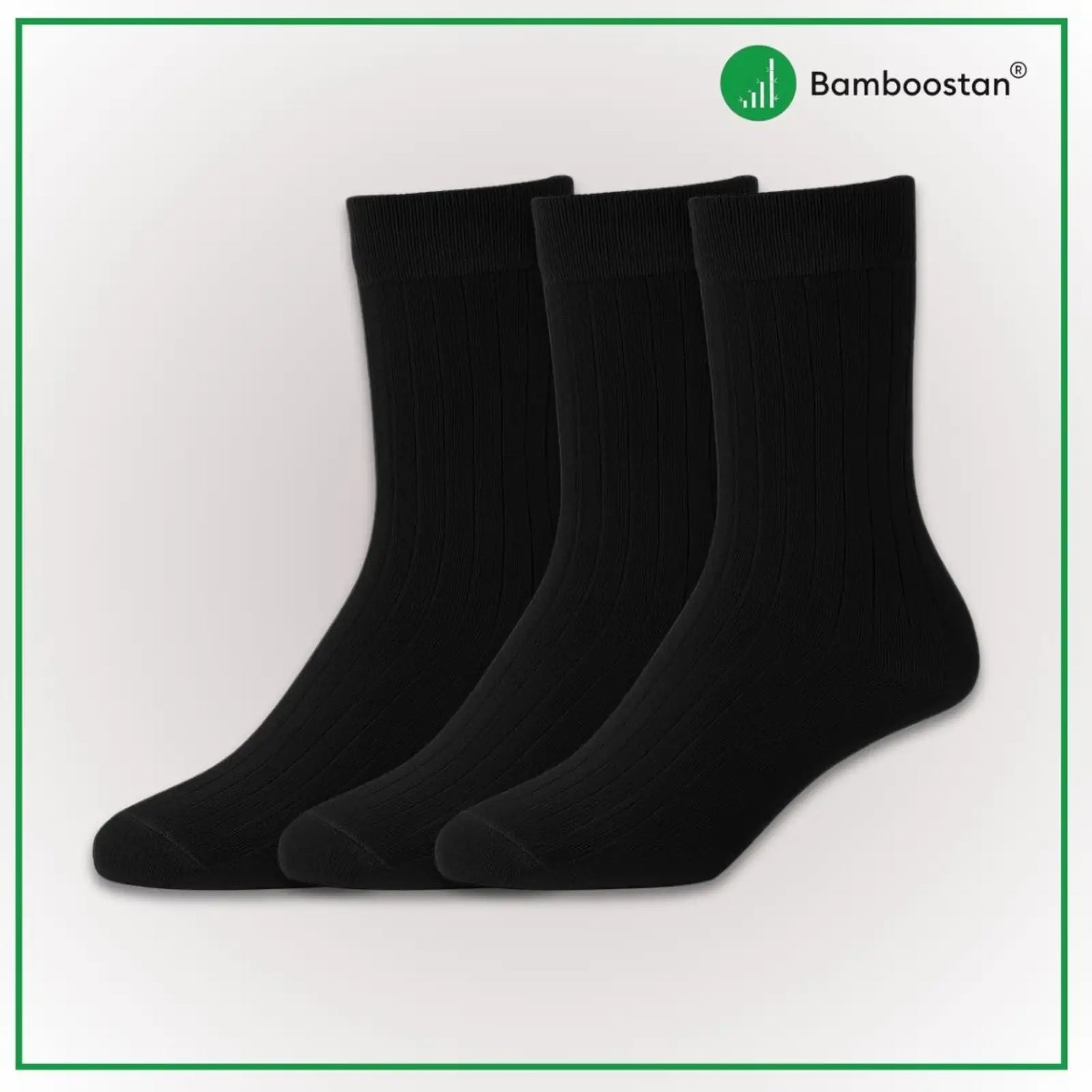 Three black bamboo socks on a light gray background with Bamboostan logo.