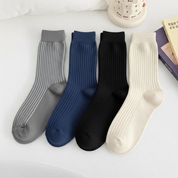 Bamboo Crew Socks in gray, navy, black, and white colors displayed together on a flat surface.