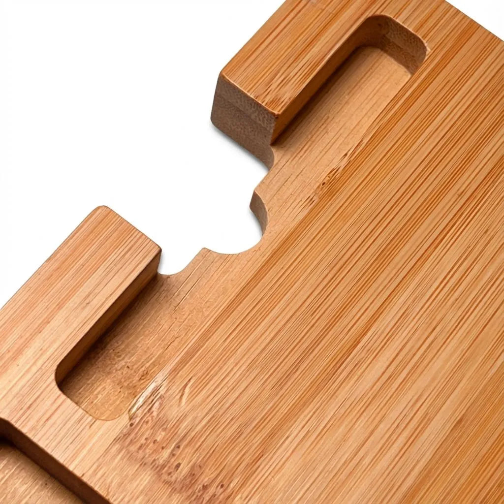 Close-up of a Bamboo multi device stand on a white background
