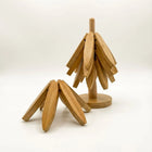 Bamboo Trivet Set featuring tree-shaped coasters made from sustainable bamboo for eco-friendly table protection.