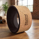 Cork Yoga Wheel by Beyond, designed for comfort and support in yoga routines, featuring a natural cork finish.