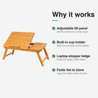 Bamboo adjustable laptop desk features — adjustable tilt panel, built-in cup holder, laptop-stopper ledge, folds flat.