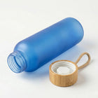 Bamboo Cap Frosted Glass Bottle with frosted blue finish and wooden cap on a light background, ideal as a stylish glass water bottle.