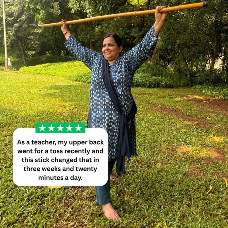 Woman holding a bamboo stick over her head in a park with text about its benefits for teachers.