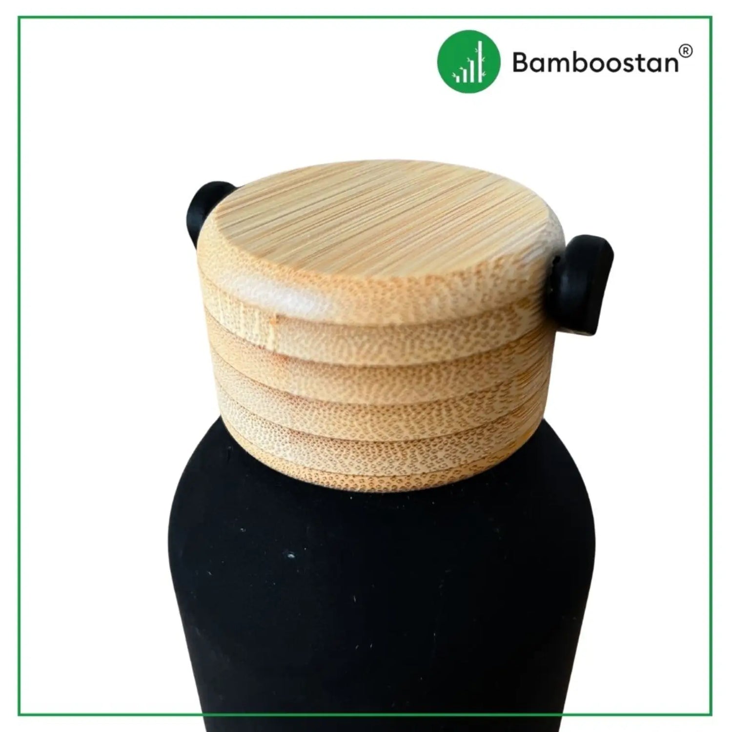 Bamboo lid on a black stand with Bamboostan logo above