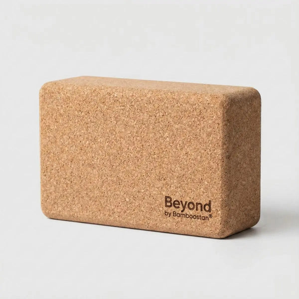 Cork yoga block on a light gray background